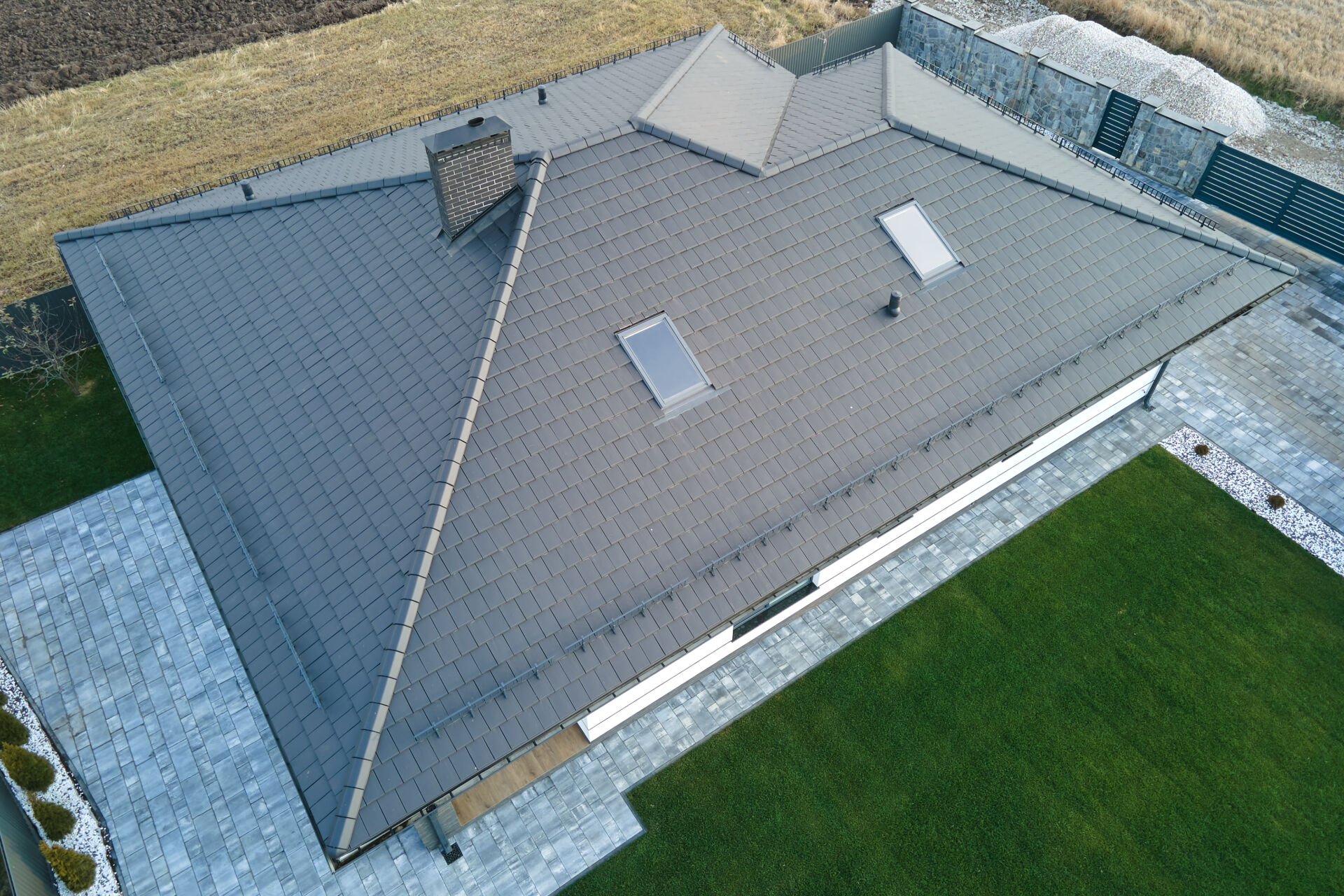 Arial view of tiled pitch roof with skylight windows