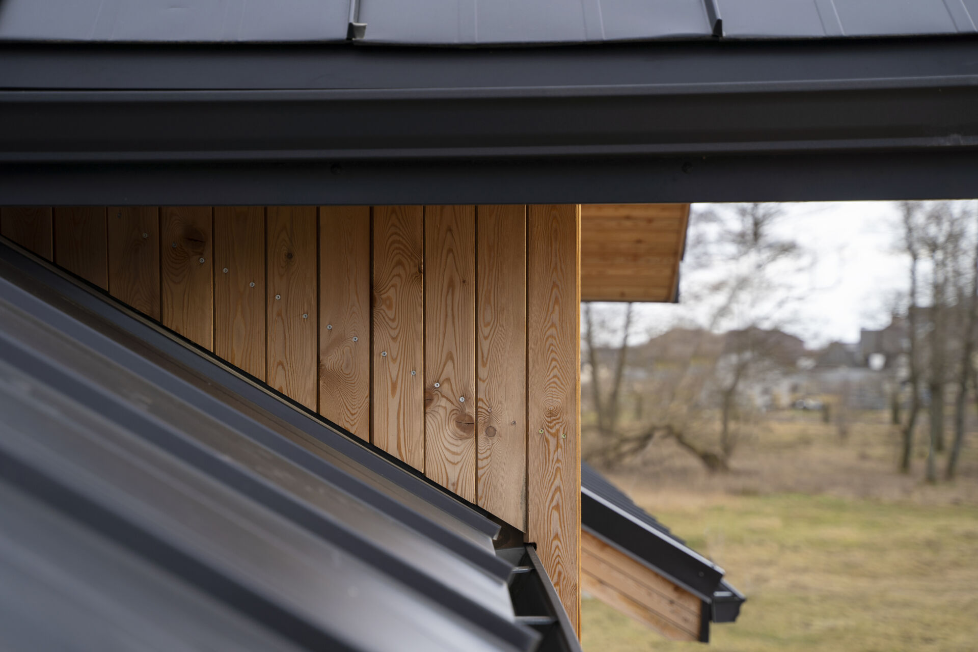 Close up of guttering attached to building fascia