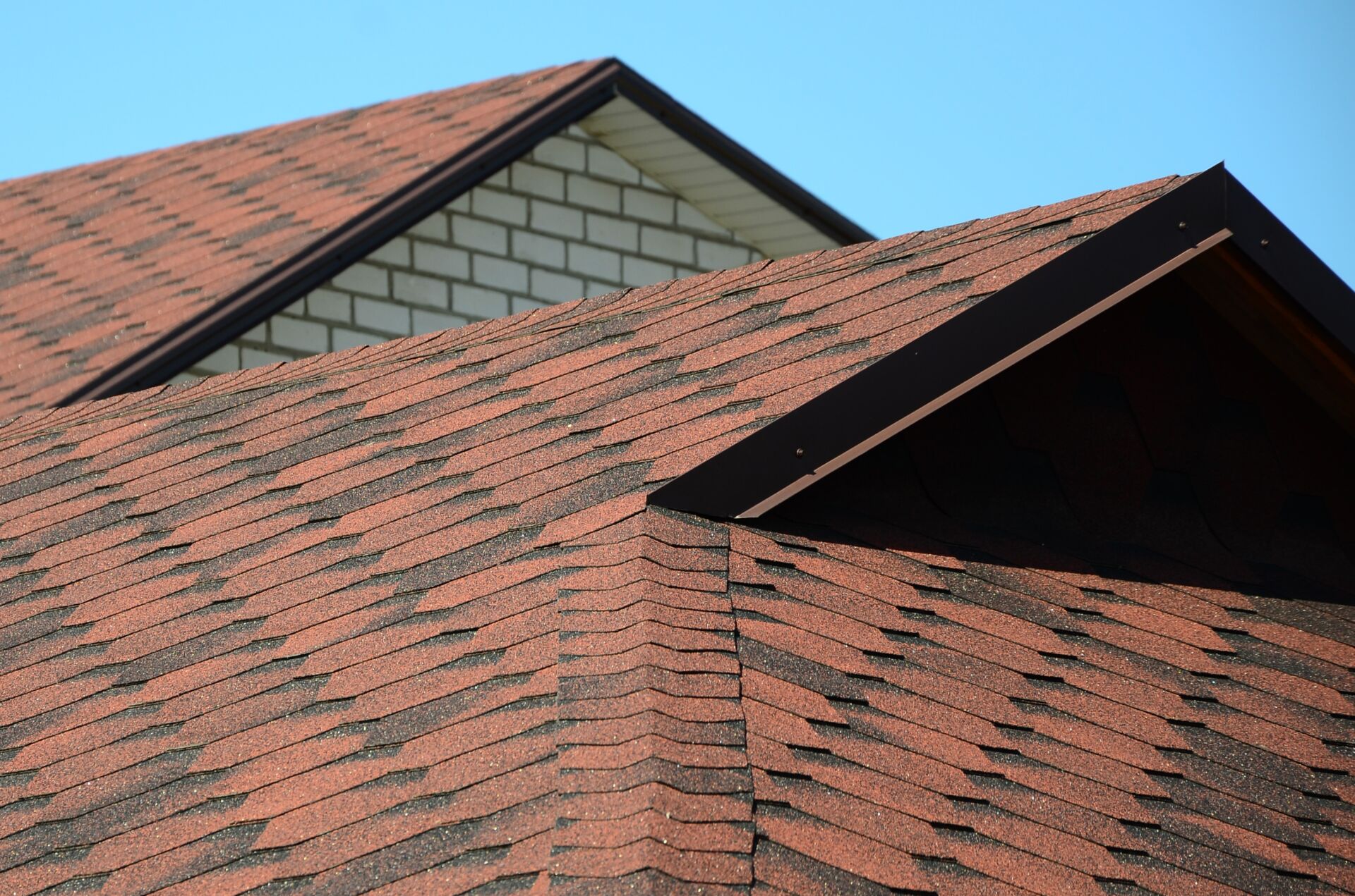 Brown bituminous shingles pitched roof tiles
